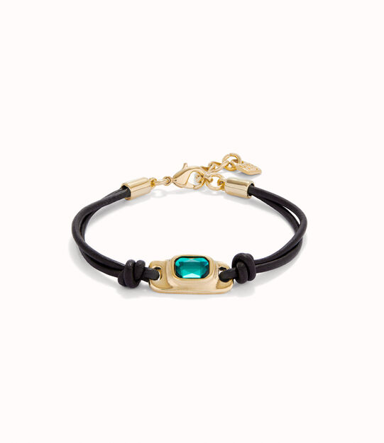 Leather bracelet with a green crystal