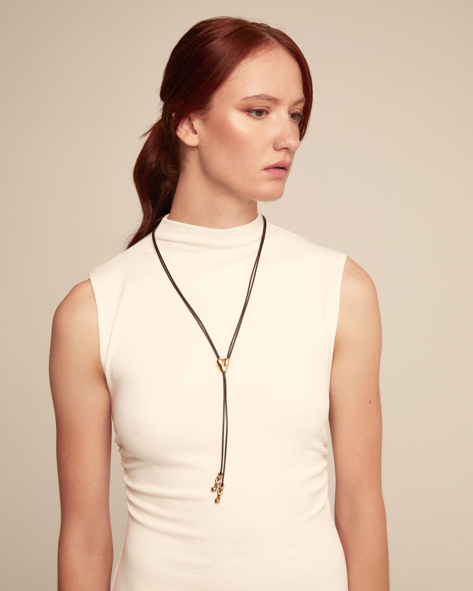 Long adjustable leather necklace with  a heart, Golden, large thumbnail